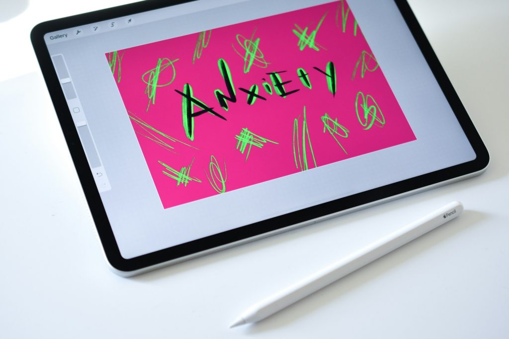 The word anxiety on a tablet